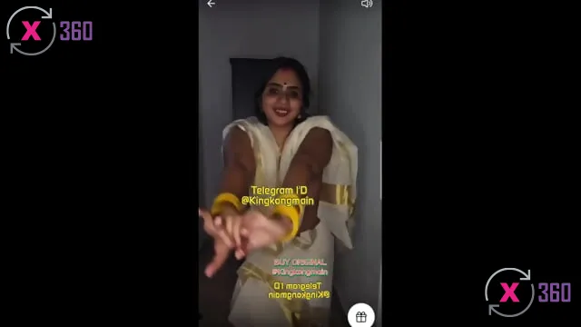 Spectacle en direct de l'Indienne Nila Nambiar : un mélange de sensualité et de mystère - Photo N°16